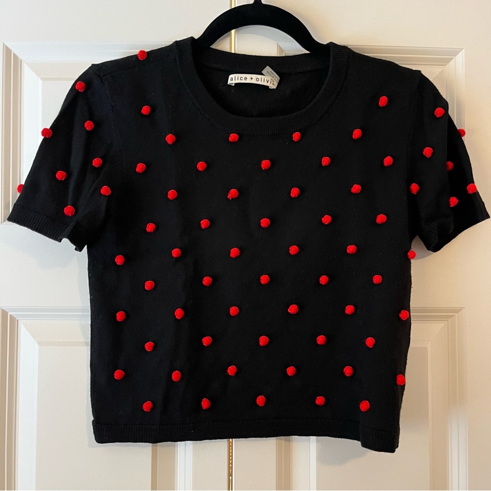 Alice + Olivia Black Cropped Sweater with Red Pom Poms